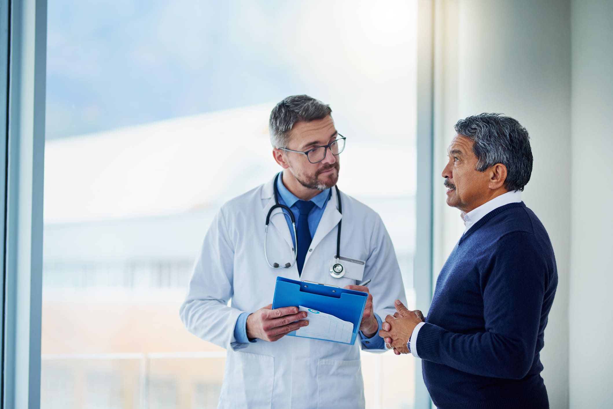 man talking to his doctor