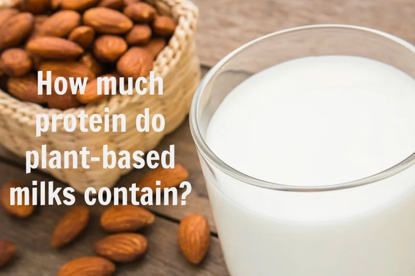 almonds next to a glass of milk