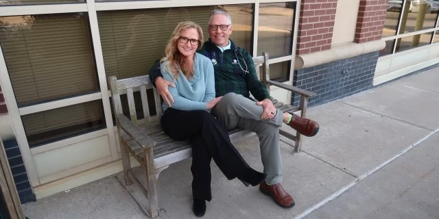 the Gaffins sitting on a bench